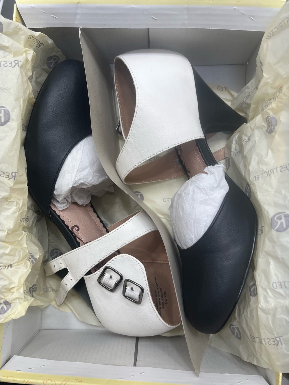 Restricted Two-Tone Black and White Women's Heel Pump